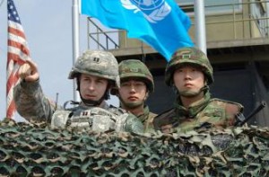 U.S. and South Korean soldiers survey the demilitarized zone from an observation post (Edward N. Johnson)