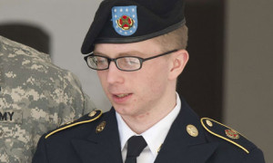 (FILES)PFC Bradley Manning is escorted by military police as he departs the courtroom at Fort Meade, Maryland in this April 25, 2012 file photo. Photograph: Jim Watson/AFP/Getty Images