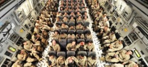 U.S. servicemen inside a plane. (photo: Vyacheslav Oseledko/AFP/Getty Images)