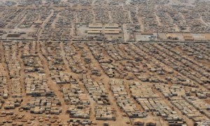 The Zaatari refugee camp near the Jordanian city of Mafraq shelters 115,000 Syrian refugees, posing a humanitarian crisis and a threat to global security, say UN officials. Photograph: Mandel Ngan/AFP/Getty Images