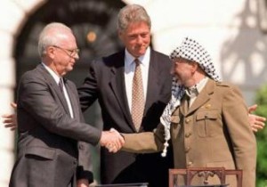 Left to right: Yitzhak Rabin, Bill Clinton and Yasser Arafat at the signing of the 1993 Oslo Accord .