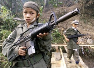 Child soldiers in Myanmar. CREDIT: Pornchai Kittiwongsakul/AFP/Getty Images