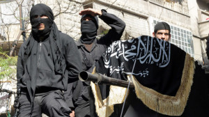 Members of jihadist group Al-Nusra Front take part in a parade calling for the establishment of an Islamic state in Syria, at the Bustan al-Qasr neighbourhood of Aleppo, on October 25, 2013.(AFP Photo / Mahmud AL-Halabi)