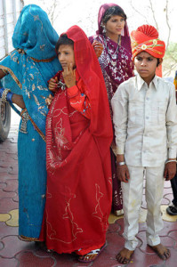 A nine-year-old boy, right, stood with his seven-year-old bride, left, near the central Indian city of Bhopal, May 7, 2011. Prakash Hatvalne/Associated Press