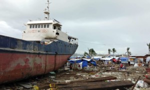 A ship washed ashore by typhoon Haiyan at Anibong in Tacloban, Philippines, 5 February 2014. Photograph: Mark Tran for The Guardian