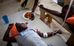 Janika Faneus is fed by her mother while receiving treatment for cholera at a Doctors Without Borders cholera clinic in Saint-Marc, Haiti, on Jan. 22, 2011. Rodrigo Abd/AP