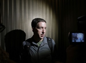  Guardian reporter Glenn Greenwald speaks to reporters at his hotel in Hong Kong in June. (AP Photo/Vincent Yu)