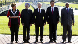 Brazil's President Dilma Rousseff, India's Prime Minister Manmohan Singh, Russia's President Vladimir Putin, China's President Xi Jinping and South African President Jacob Zuma pose for a photo after the BRICS leader's meeting at the G20 summit on September 5, 2013 in Saint Petersburg.(AFP Photo / Sergei Karpukhin )