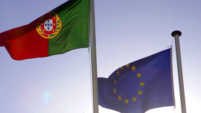 Portuguese flag, left of the European. AFP Photo/Nicolas Asfouri