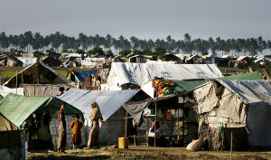 Rohingya families crowd a tented camp on the outskirts of Sittwe, Myanmar. (Photo: Paula Bronstein/Getty Images)