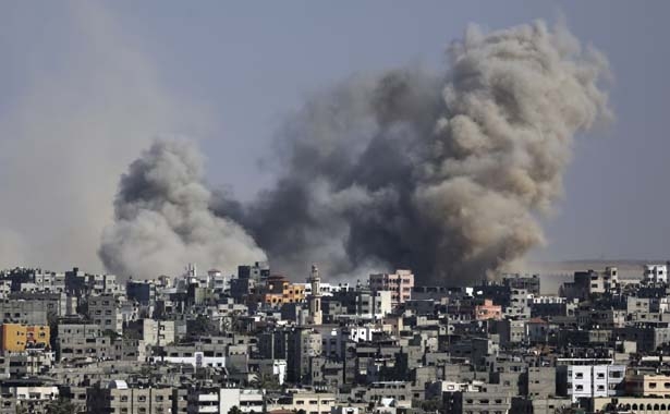 Smoke from an Israeli strike rises over the Gaza Strip. (AP, Hatem Moussa)