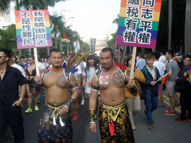 Two marchers in Taiwan`s 11th annual LGBT Pride March in Taipei City Oct. 26 affirm that "I am proud to be gay; I'm not a sex refugee!" Credit: Dennis Engbarth/IPS