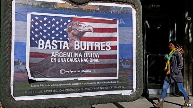 "Enough vultures - Argentina united around a national cause," reads the poster displayed in Buenos Aires