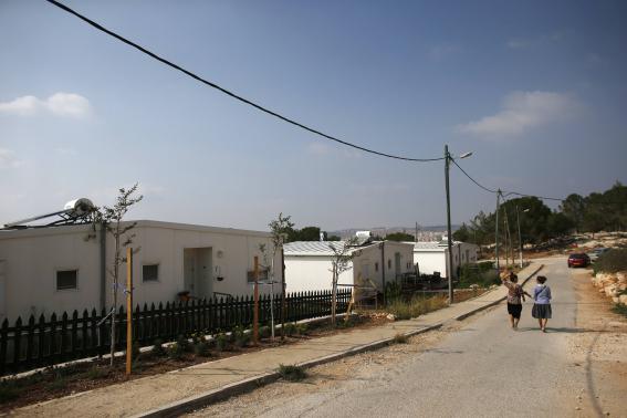 Israeli women walk in a Jewish settlement known as 'Gevaot', in the Etzion settlement bloc, near Bethlehem August 31, 2014. Israel announced on Sunday a land appropriation in the occupied West Bank that an anti-settlement group termed the biggest in 30 years and a Palestinian official said would cause only more friction after the Gaza war. Some 400 hectares (988 acres) in the Etzion settlement bloc near Bethlehem were declared 'state land, on the instructions of the political echelon' by the military-run Civil Administration. Construction of a major settlement at the location has been mooted by Israel since 2000. Last year, the government invited bids for the building of 1,000 housing units at the site.