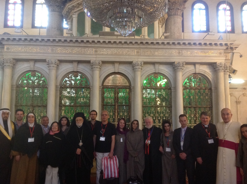 Umayyad Mosque. In front of the tumb of St John Baptist placed at the center of the mosque.