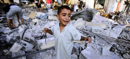A Palestinian boy cries as he stands in a debris-strewn street near his family's house, which witnesses said was damaged by an Israeli air strike in Rafah in the southern Gaza Strip August 26, 2014. (photo: Ibraheem Abu Mustafa/Reuters)