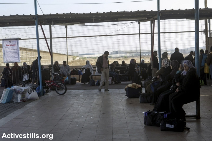 Palestinians wait at the Gaza side of the Erez crossing, Beit Hanoun, Gaza Strip, November 19, 2013. Erez is the only point of crossing for persons between Israel and the Gaza Strip, and with the tightening of the siege, a very low number of Palestinians are able to obtain permits. Photo by Anne Paq/Activestills.org