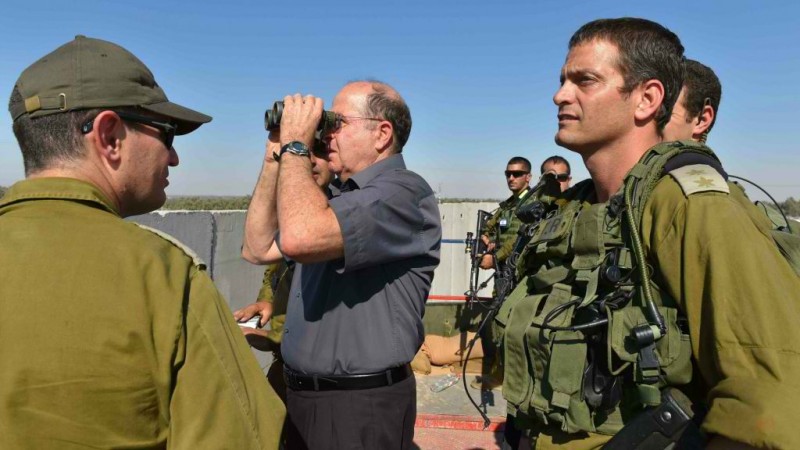 Moshe Ya’alon trying to make out the vast Hamas army advancing on Israel. He knows it’s there. Photo by EPA/IDF