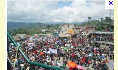 Miles de personas marchan en solidaridad en contra del Decreto 19-2014 en Los Encuentros, Sololá.