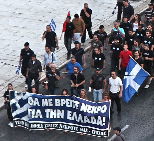 The profile of Golden Dawn in Greece, pictured here demonstrating in 2012, is eerily similar to that of the German National Socialist (Nazi) Party in its early years. (Photo: Steve Jurvetson / Wikimedia Commons)