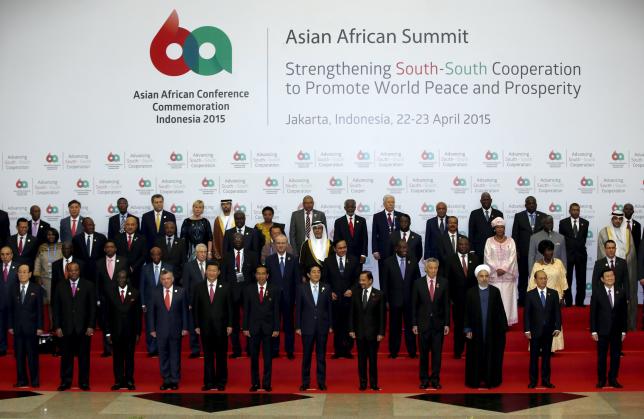 Leaders from Asia and Africa pose for a group photo before the start of the Asian-African Conference in Jakarta April 22, 2015. REUTERS/Darren Whiteside