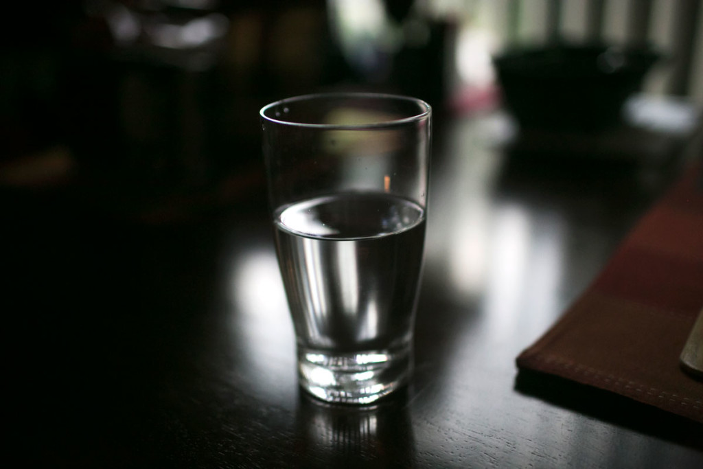 A glass of filtered water sits on Ken Wamsley's kitchen table in Parkersburg, WV.