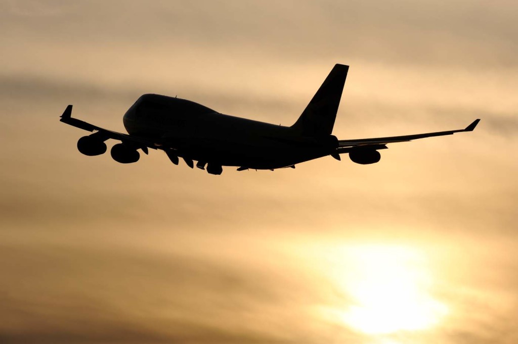 Chartered planes take failed asylum seekers back to their home countries. Photo via Flickr, stock image of plane taking off