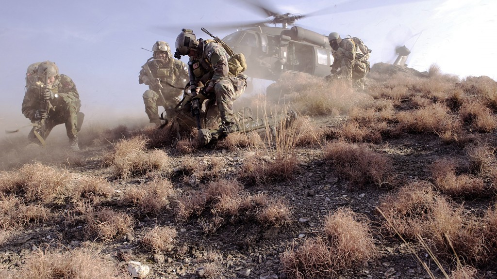 U.S. special operations personnel prepare to board a UH-60 Black Hawk helicopter during a mission in Kunar province, Afghanistan, Feb. 25, 2012. Photo: U.S. Department of Defense