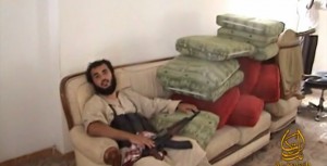 Bilal el-Berjawi holding an AK-47 rifle in a martyrdom video produced after his death by al Shabaab’s media wing.