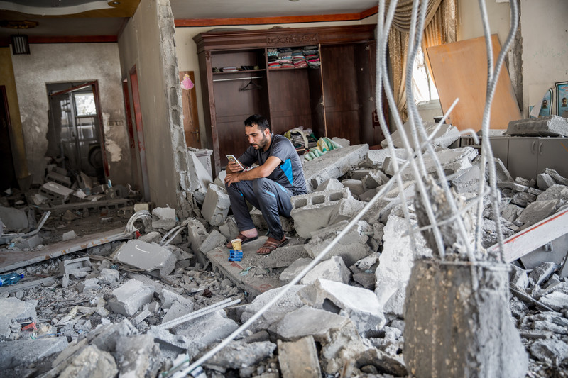 A member of the Abu Jaber family sits in the ruins of the East Jerusalem family home that was demolished by the IDF on 6th October 2015. A member of the family, Ghassan Abu Jaber, killed four worshippers in an attack on a synagogue last year. Photo by Yotam Ronen /ActiveStills