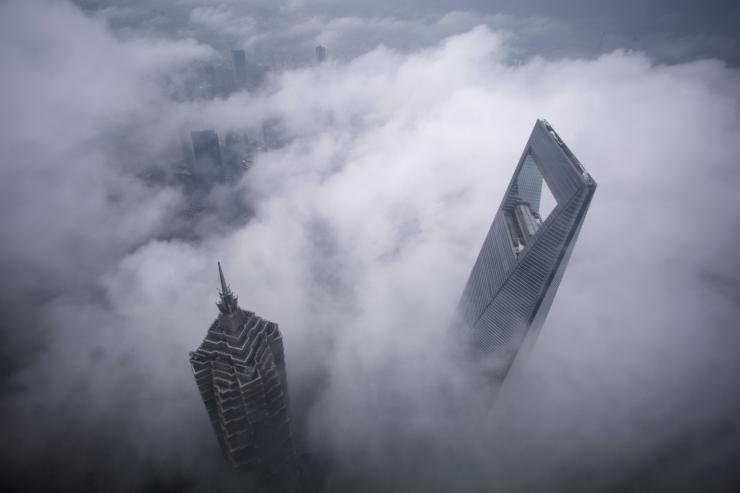 The Shanghai World Financial Center and the Jin Mao Towers rise above low cloud cover. Global wealth inequality in 2015 increased to levels “possibly not seen for almost a century,” according to Credit Suisse. Reuters/Aly Song
