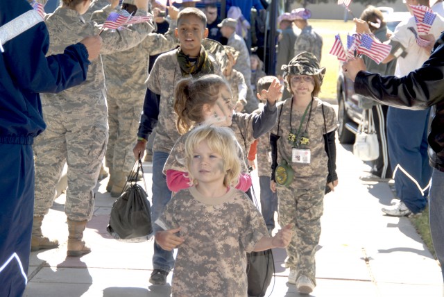 In Operation KIDS, a 5 year old “leads her squad home.” From www.af.mil.