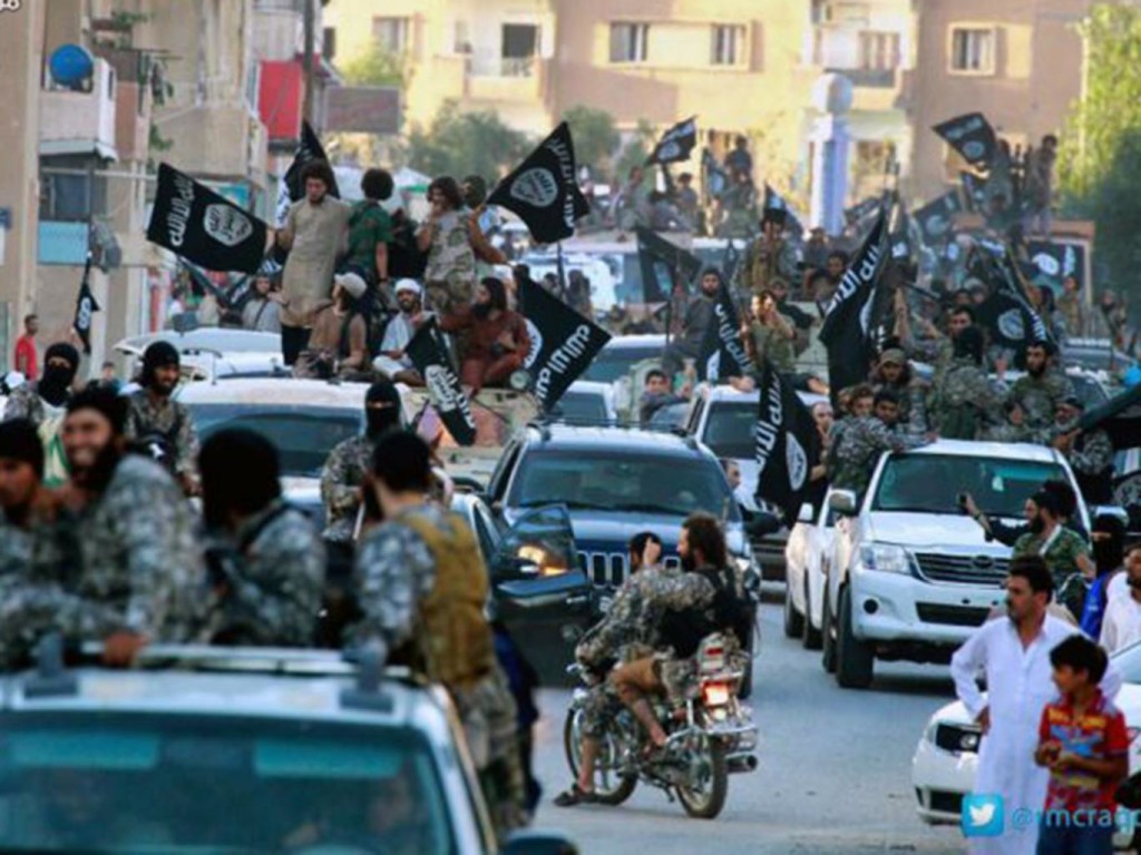 Islamic State fighters in Raqqa (AP) AP