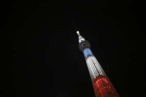 The Tokyo Skytree, the tallest tower in Japan, is illuminated with the colors of the French tricolor.(Credit: AP)