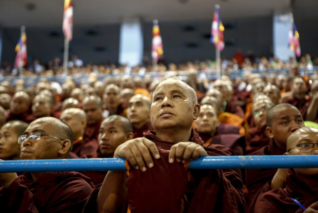  Buddhist monks attend a Ma Ba Tha ceremony to mark the approval of race and religious laws at Thuwana indoor stadium in Rangoon on Oct. 4. (Lynn Bo Bo/EPA)