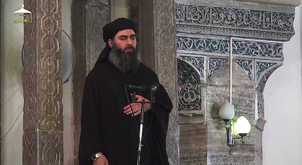 The leader of the militant Islamic State Baghdadi delivers a Friday sermon from the Great Mosque in Mosul, Iraq. AP