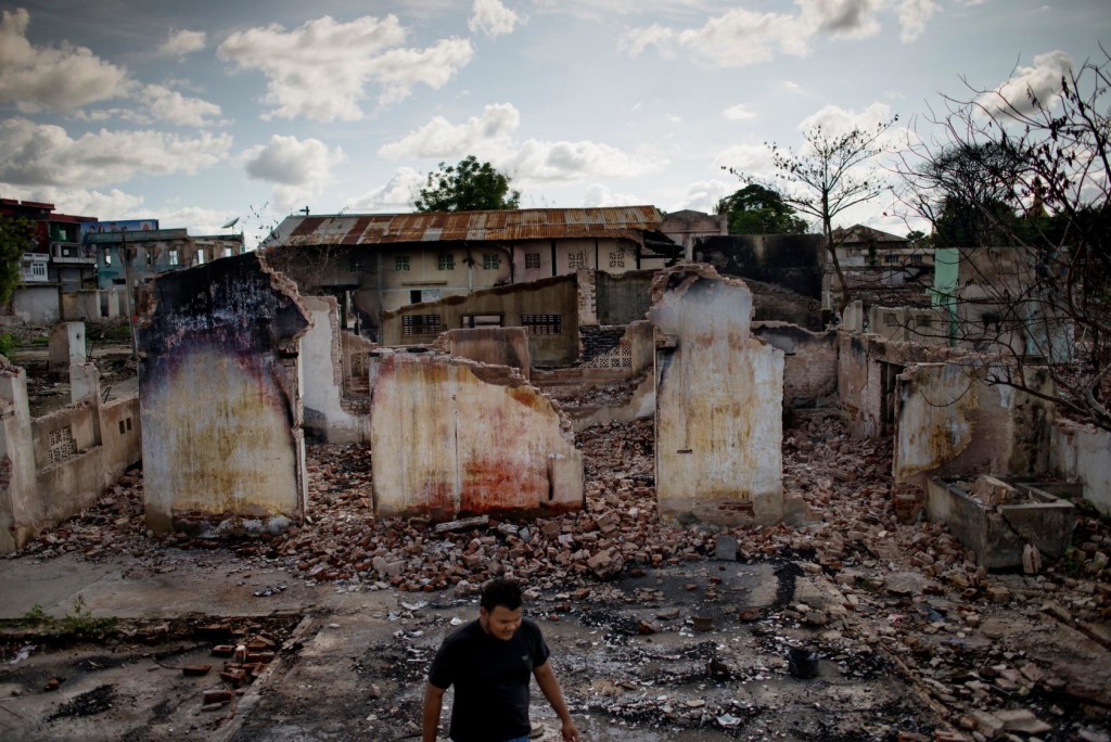 Jonas Gratzer A Muslim man walks around the ruins of what was once his family's home after waves of violence led against Muslims by Buddhists destroyed and left many buildings in ruins during the riots of March 2013 in the Muslim quarter of the Burmese city of Mektila