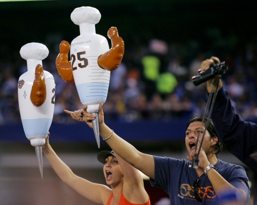 New York Mets fans taunt Barry Bonds with inflated hypodermic needles in 2007.New York Daily News Archive / Getty Images