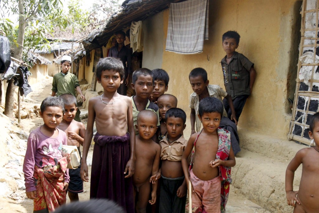 Rohingya children pose for the camera at the Kutupalong refugee camp May 31, 2015. PHOTO: REUTERS/Rafiqur Rahman