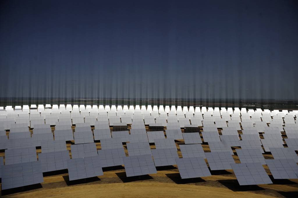 Solar panels facing a solar tower taken in Sanlucar de Barrameda, Spain. (Cristina Quicler/AFP/Getty Images)