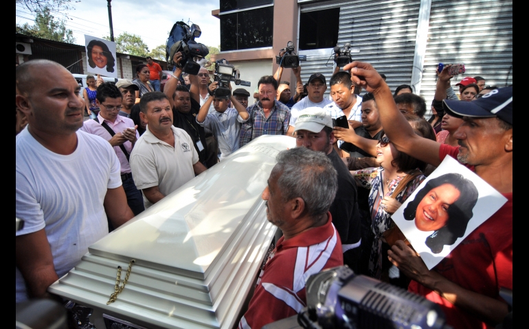 People carry the coffin of indigenous leader and environmental activist Berta Caceres after a five-hour autopsy at the Forensic Medicine Center in Tegucigalpa, Honduras, March 3. (CNS/EPA/Stringer)