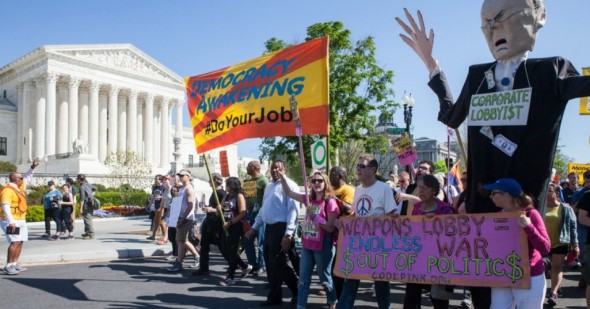 Above Photo: Democracy Awakening demonstrators marched past the U.S. Supreme Court on Sunday. (Photo: Greenpeace/Tim Aubry)