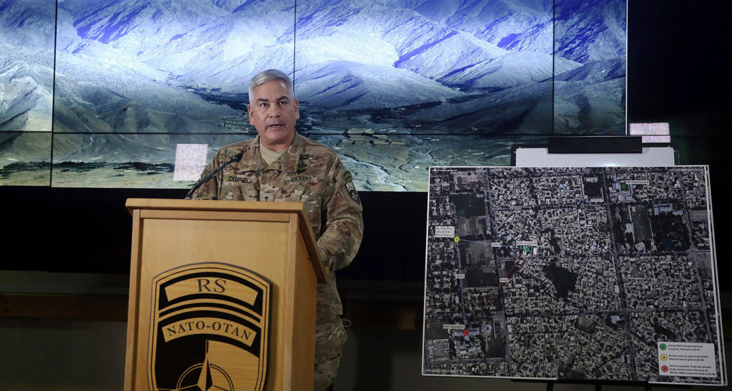 Gen. John F. Campbell, commander of U.S. and NATO forces in Afghanistan, stands beside a map of the city of Kunduz as he addresses a press conference at Resolute Support headquarters in Kabul on Nov. 25, 2015. Photo: Massoud Hossaini/AFP/Getty Images