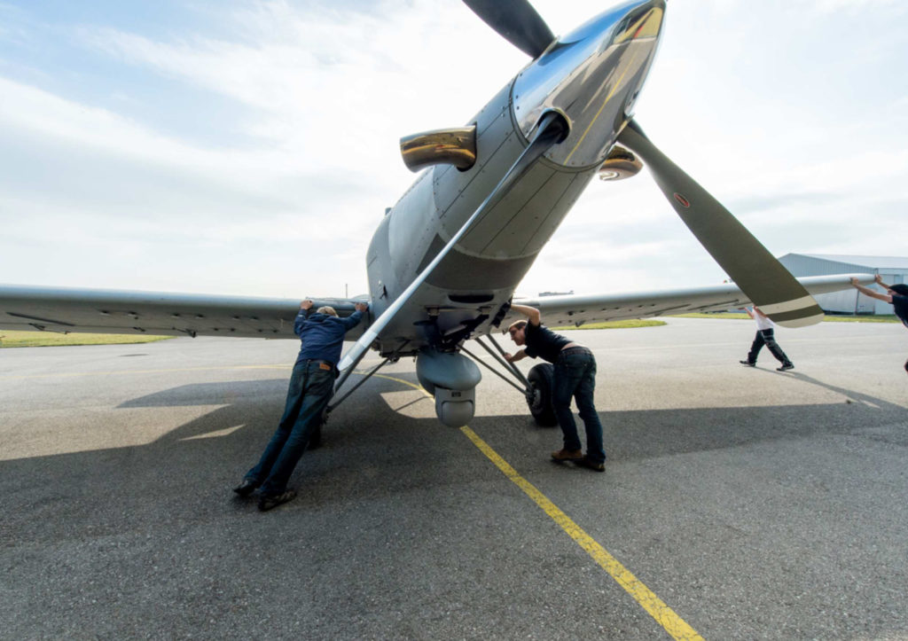 Airborne technicians in Austria work on the surveillance gear attached to one of the Thrush airplanes. Photo obtained by The Intercept