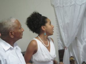 Babalawo and anthropologist Ernesto Valdez Janet and his niece Janet perform a song praising the Orishas at Proyecto Orunmila in Regla. – Photo courtesy of Marilyn Langlois