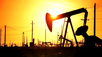 stock-footage-pump-jacks-in-perpetual-motion-drilling-for-crude-oil-in-desert-location-at-sunset