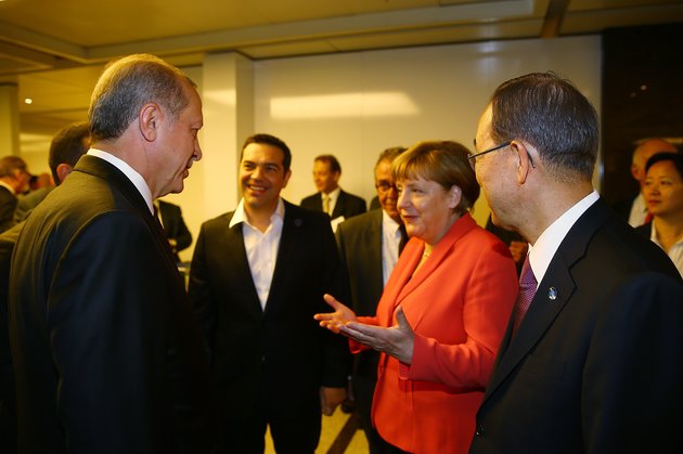 Turkish President Recep Tayyip Erdogan (left) talks with U.N. Secretary General Ban Ki-moon (right), German Chancellor Angela Merkel and Greek Prime Minister Alexis Tsipras (second left) during the World Humanitarian Summit in Istanbul on May 23. Merkel was the only leader out of the “G7” countries to attend. Credit: Kayhan Ozer/Anadolu Agency/Getty Images