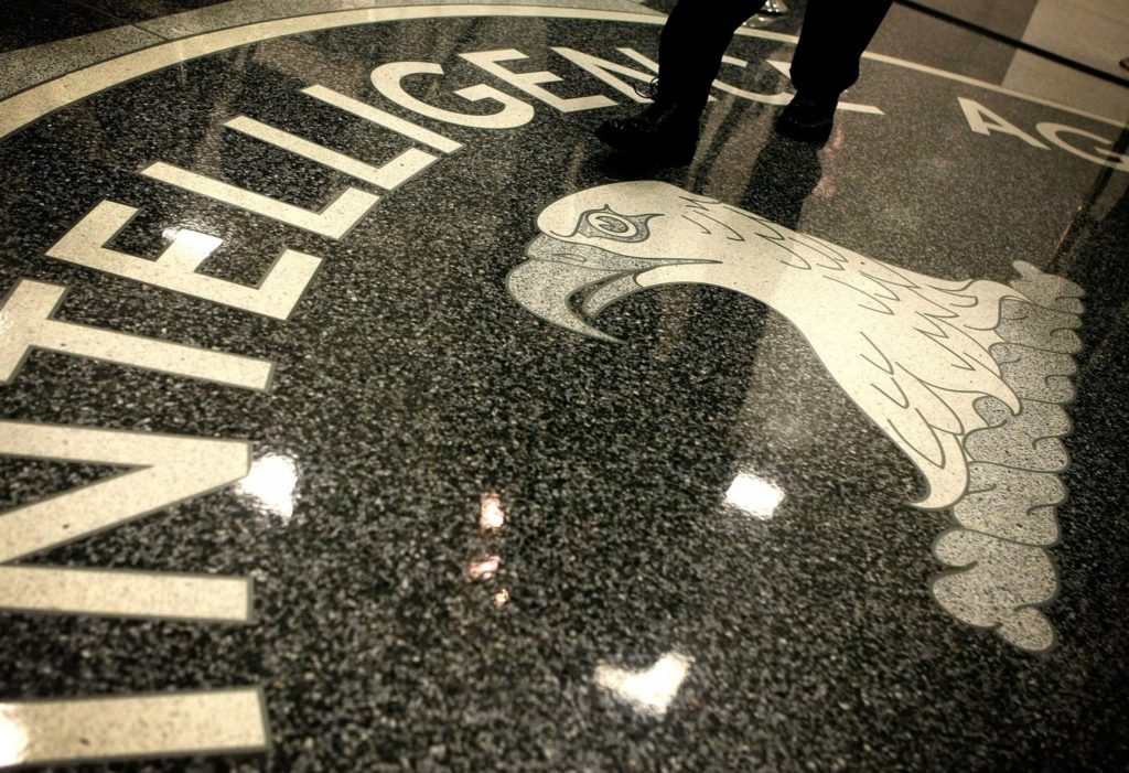  A man walks across the seal of the Central Intelligence Agency at the agency’s headquarters. (Alex Wong/Getty Images)