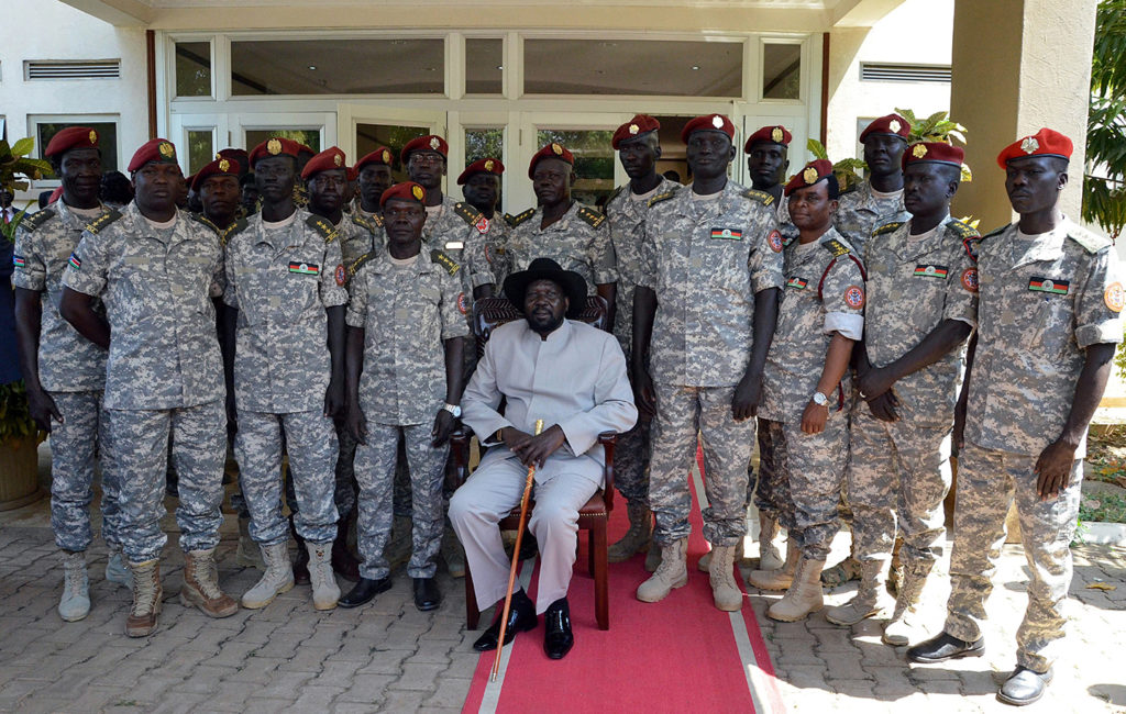 President Salva Kiir, center, poses for a photo with members of the presidential guard during a meeting in Juba, South Sudan, on Dec. 28, 2014. Photo: Photo by Samir Bol/Anadolu Agency/Getty Images