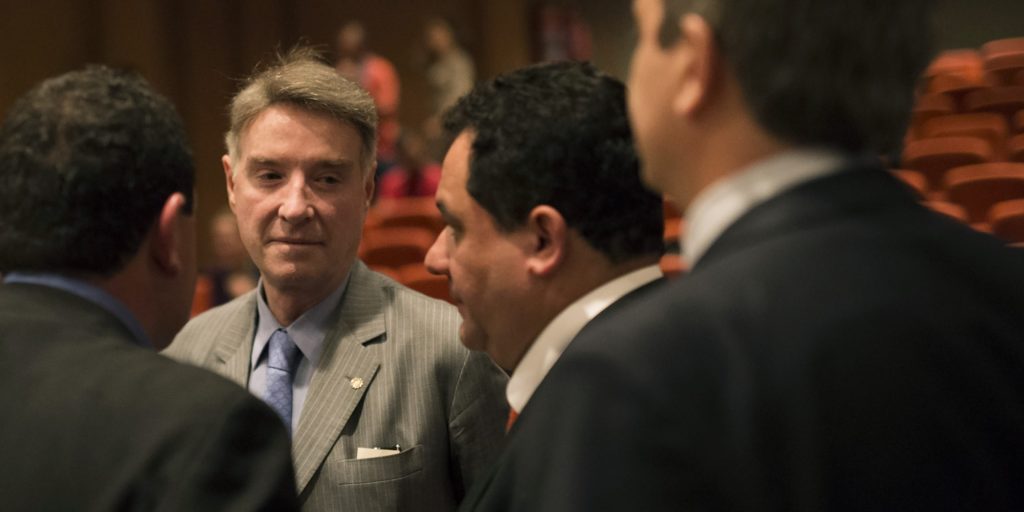 Former billionaire Eike Batista, a Brazilian tycoon once named No. 7 on Forbes’s list of the world’s richest people, talks with his lawyers during a hearing at a federal criminal court in Rio de Janeiro, Brazil, on Nov. 18, 2014. Batista went on trial in an insider trading case that could make him the first person in the country to go to prison on such charges.